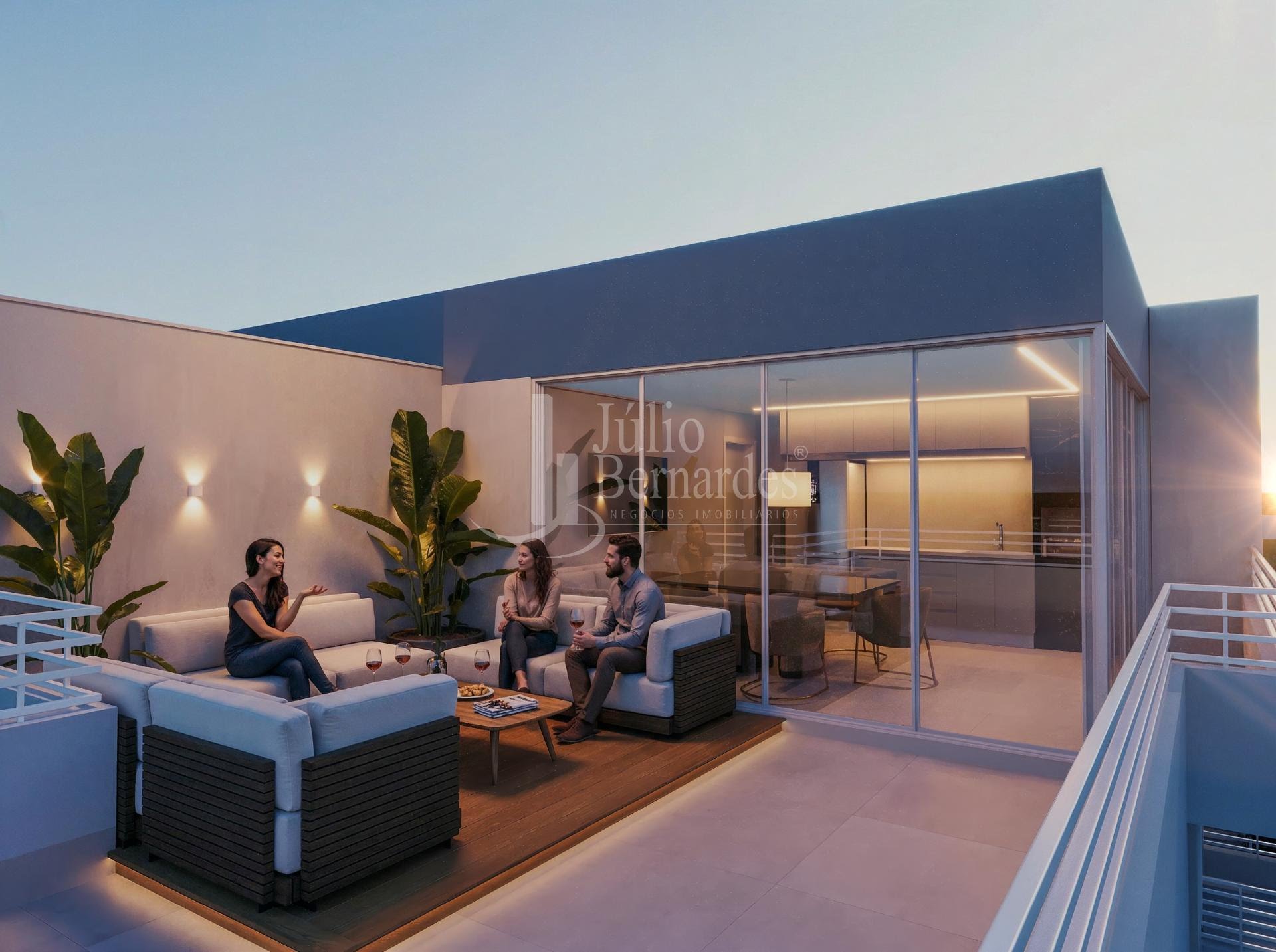 Terraço e área de convivência do Residencial Villa Parque ao entardecer